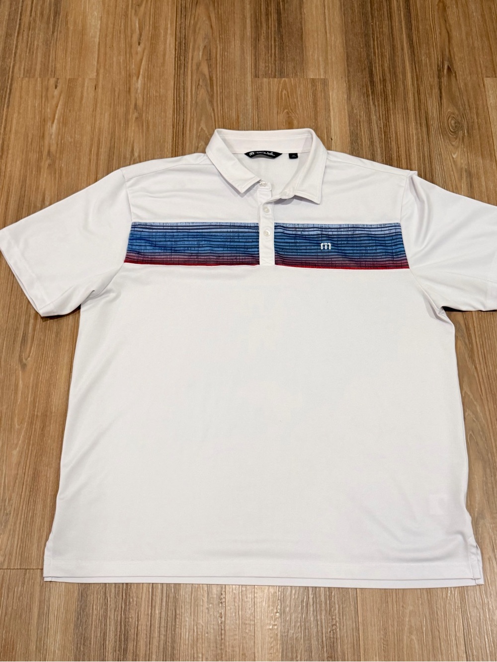 Travis Mathew Men's XXL White Polo Shirt with Blue & Red Stripe Detail